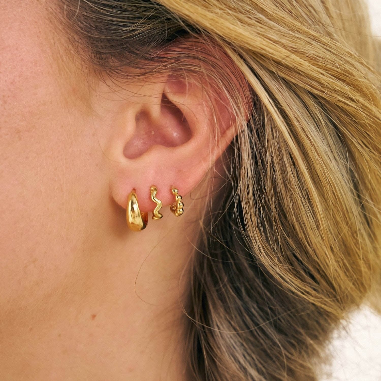Grip Huggies in an it girl earring stack