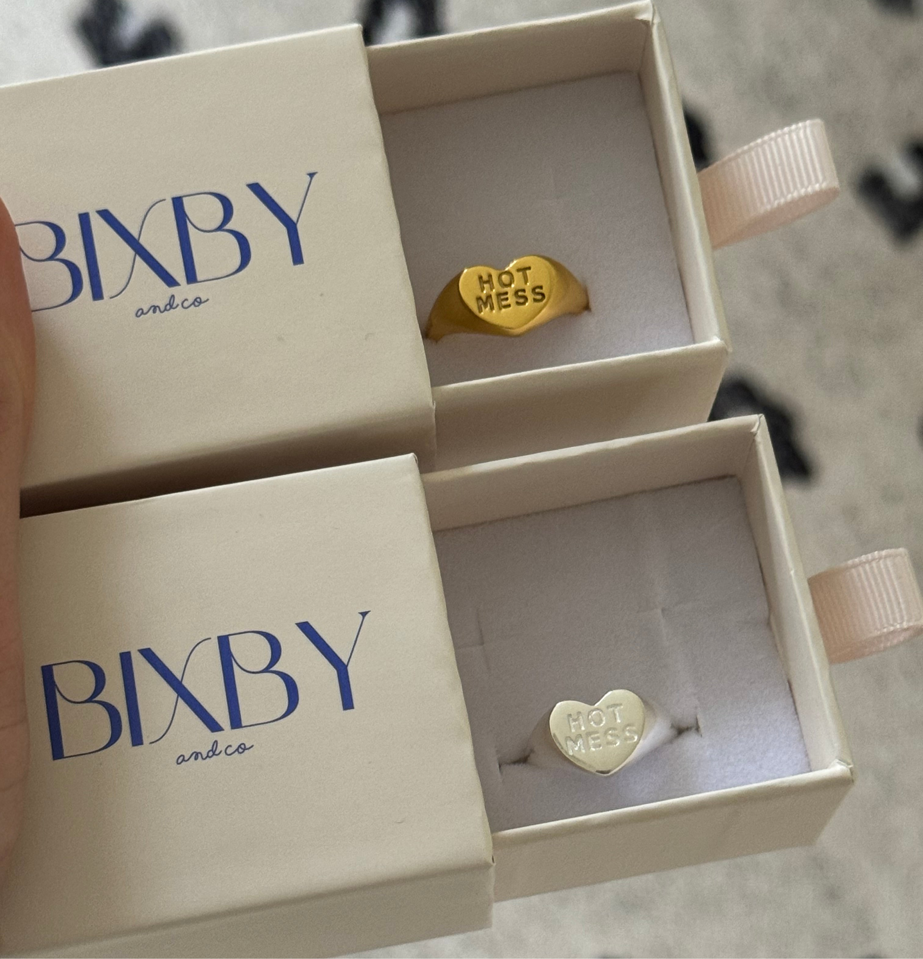 Gold 'HOT MESS' ring in a Bixby and co box