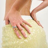 Model in coloured gemstone Bixby Rings