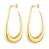 Long sculptural gold hoop earrings