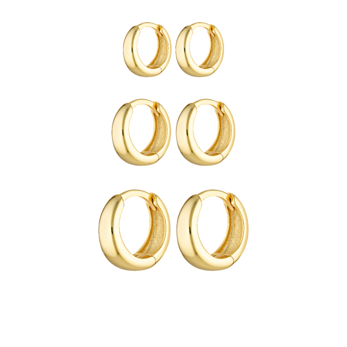 Set of gold hoop earrings on a white background