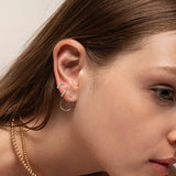 Silver Mochi Huggies in a stack