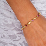 Garnet and textured gold detail bracelet