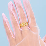 Close p of Luna Ring on gloved hand