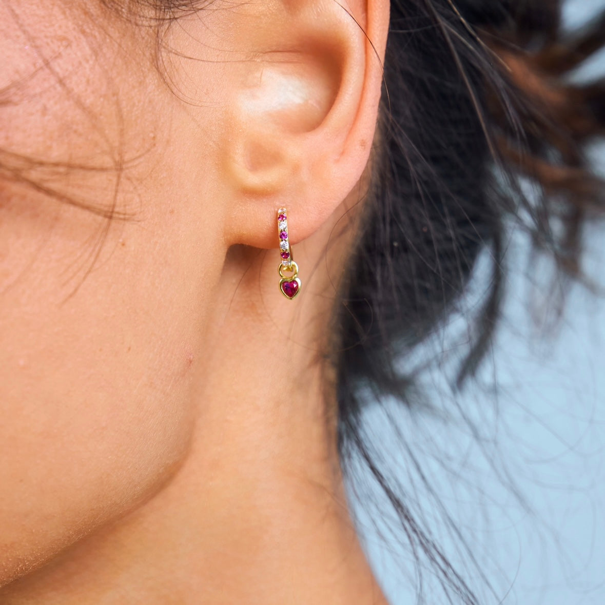 Close up of bright pink delight Huggies with heart charm