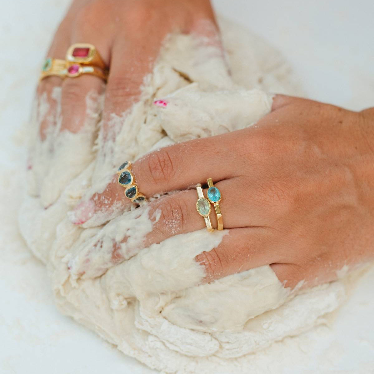 Beautiful colourful gemstone jewellery on a hand