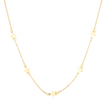 Gold necklace with star pendants on a white background