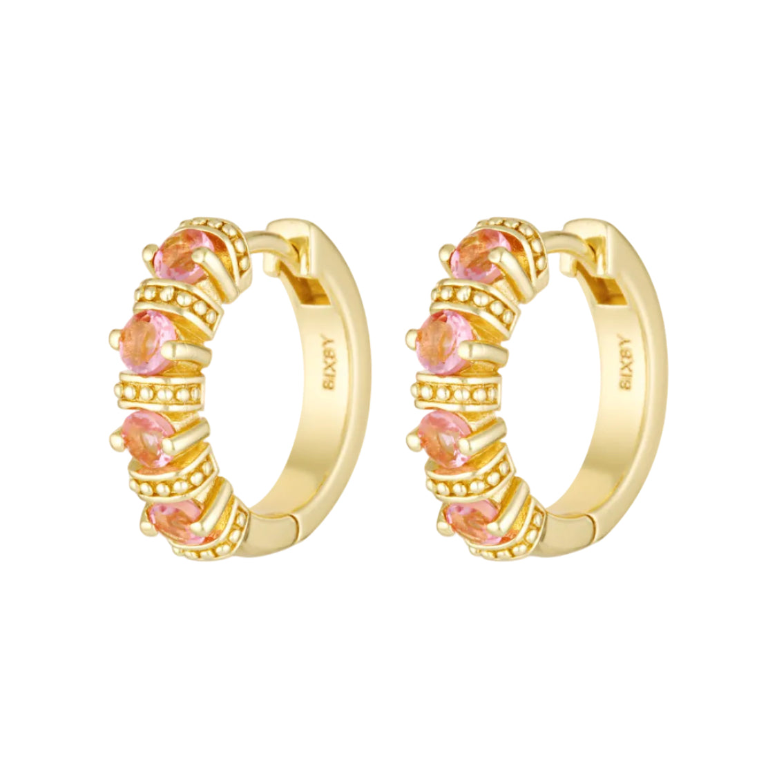 Gold hoop earrings with pink gemstones on a white background