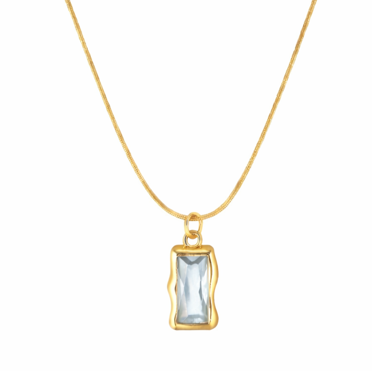 Gold necklace with a rectangular pendant on a white background