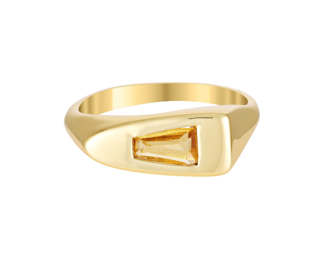 Citrine and Gold ring with a rectangular stone on a white background