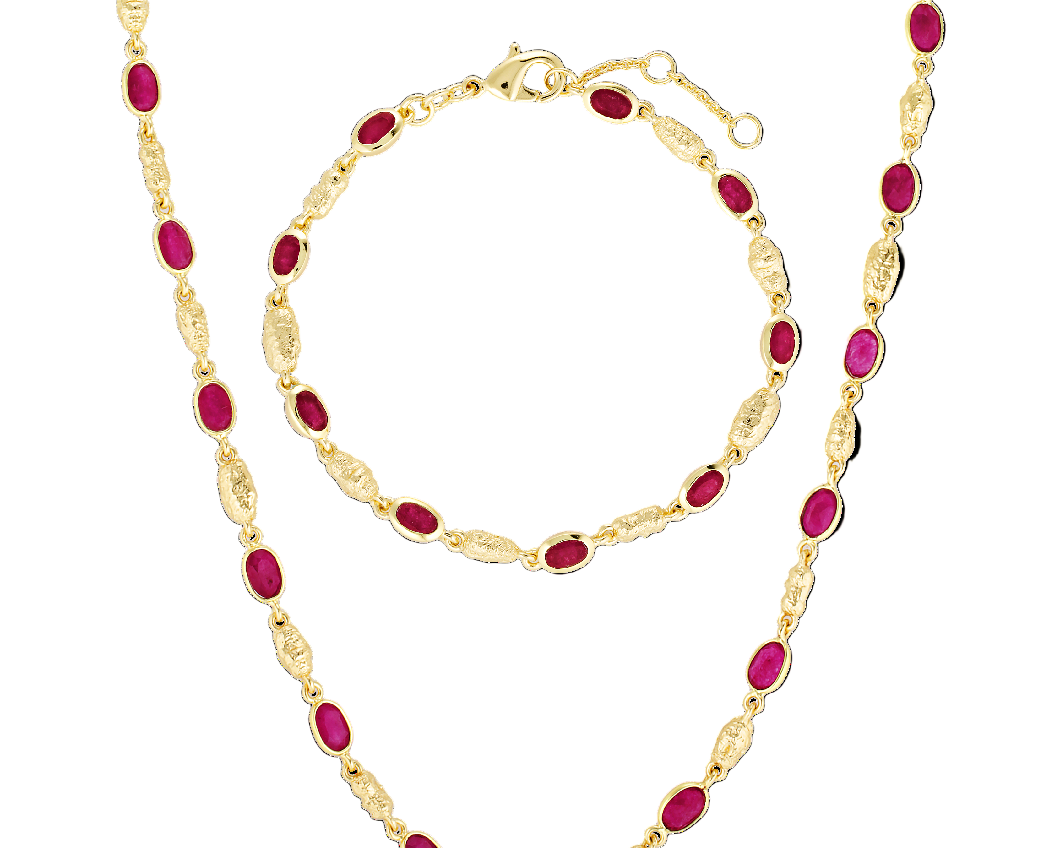 Gold necklace with red beads on a white background
