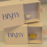 Bixby jewelry boxes with heart-shaped 'Hot Mess' rings inside