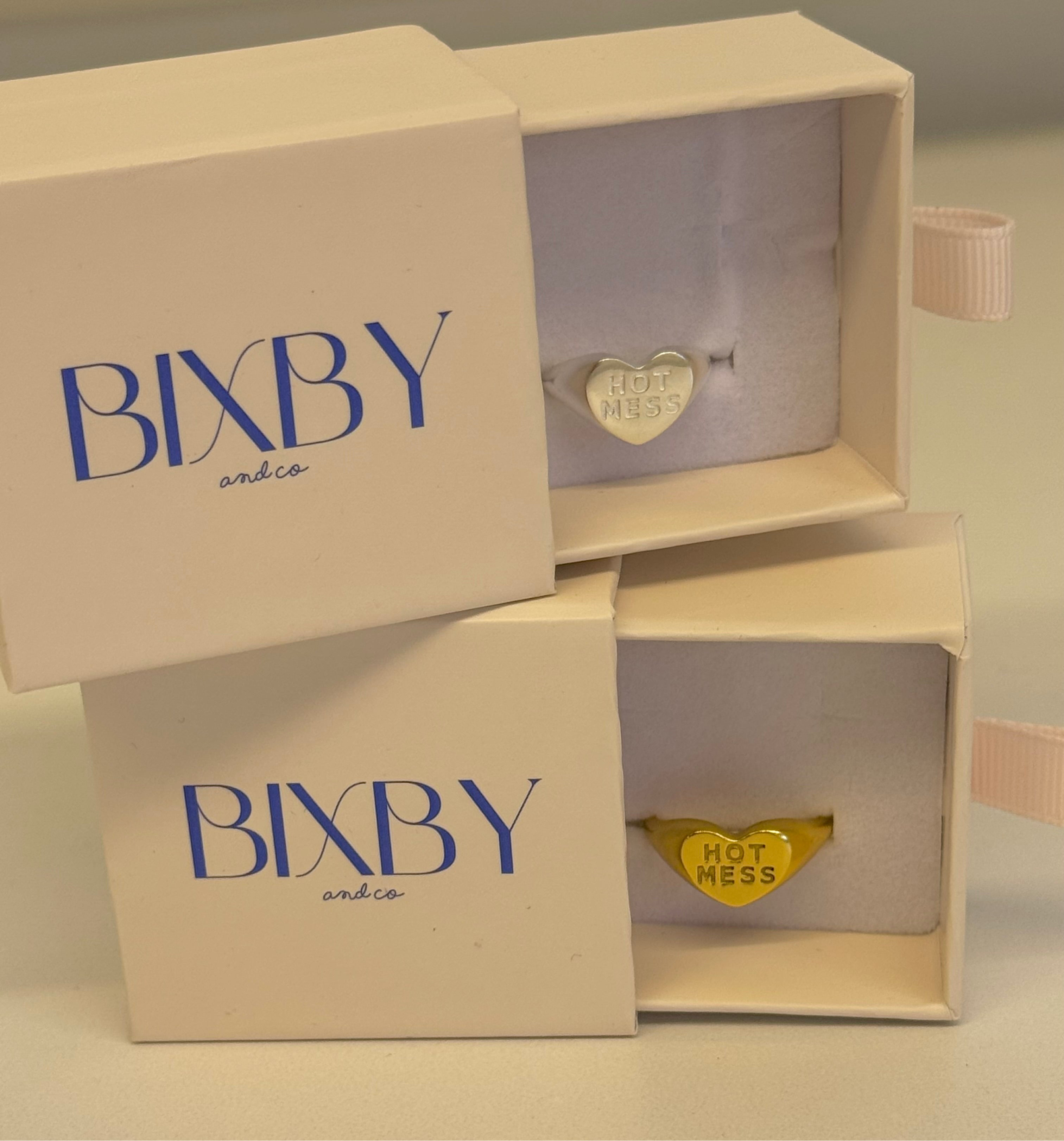 Bixby jewelry boxes with heart-shaped 'Hot Mess' rings inside