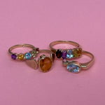 Flat lay of Legacy antique gold rings 