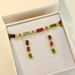 Jewelry set with multicolored gemstones in a box