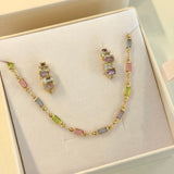 Jewelry set with necklace and earrings on a soft surface
