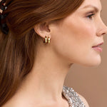 Double Maribo Hoops in one ear. Square shaped gold hoops