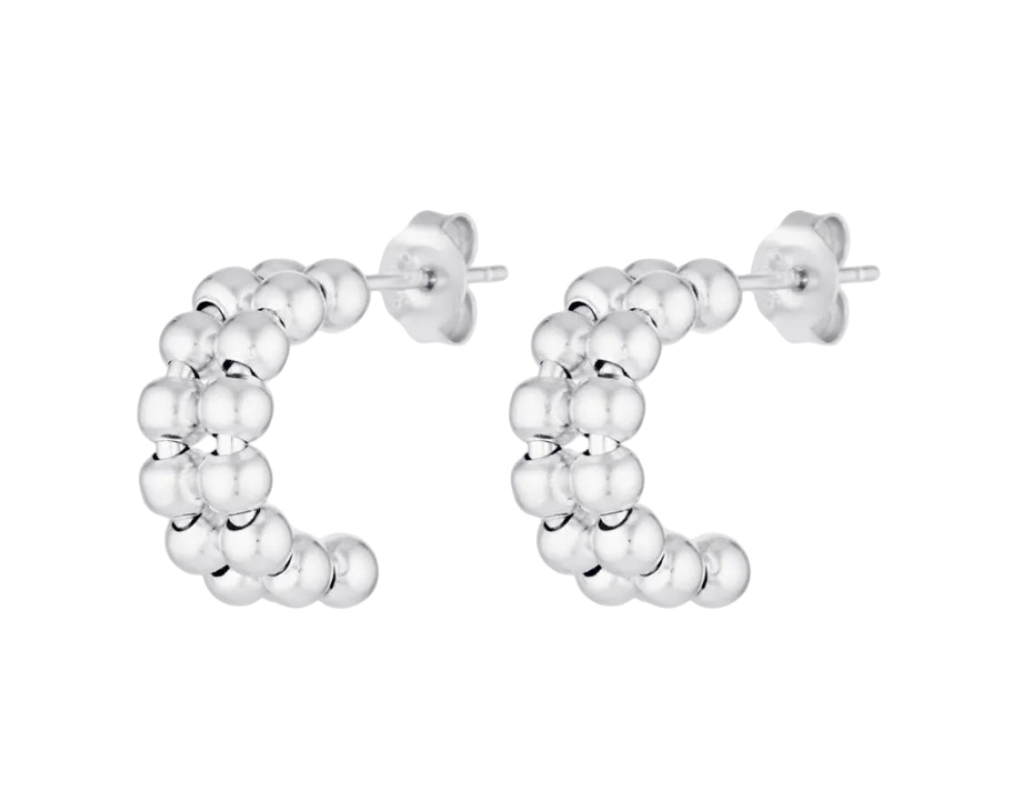 Silver hoop earrings with a bubble design on a white background