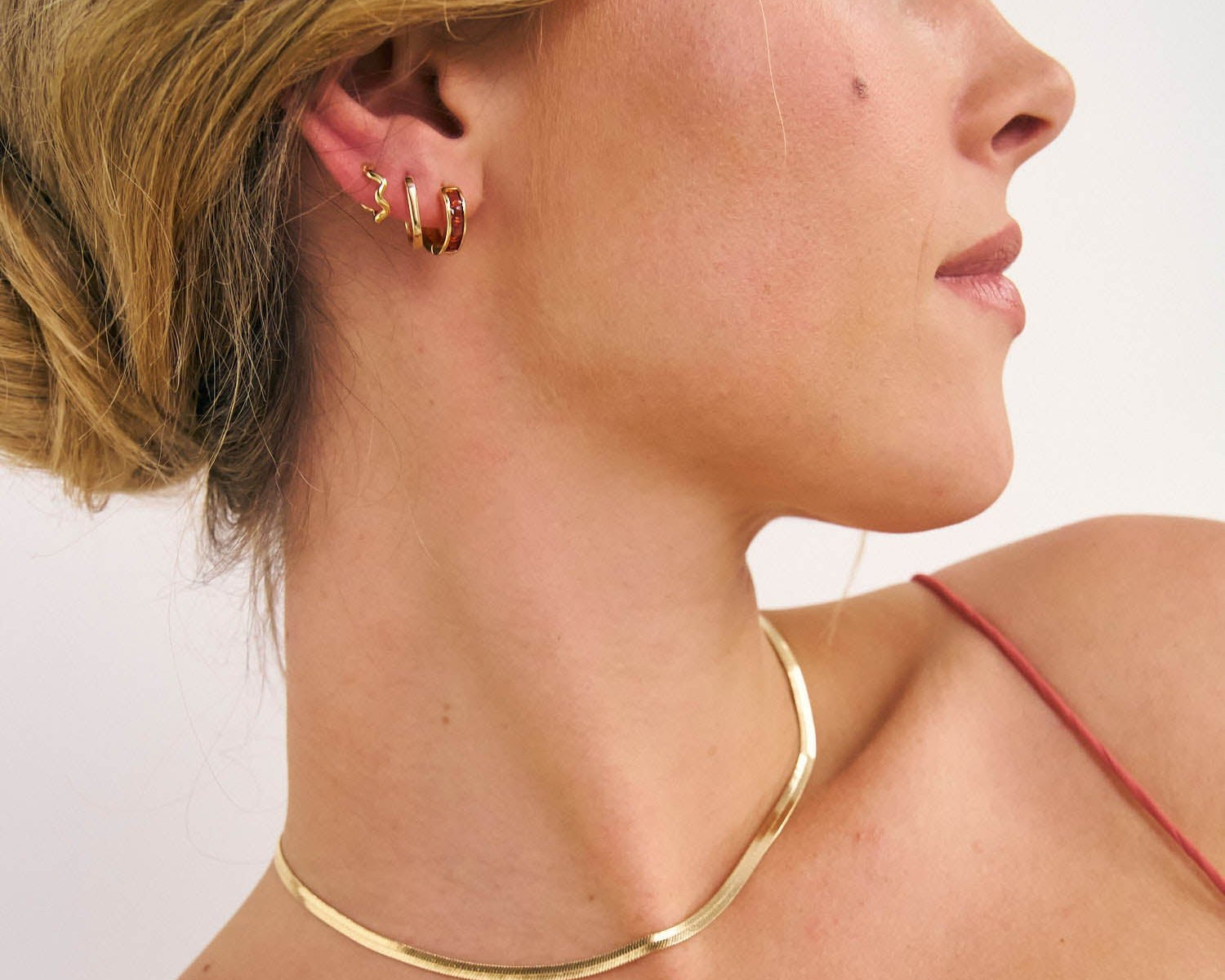 Model in Gold Serpent necklace in 18k Gold Fill