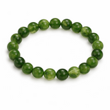 Green beaded bracelet on a white background