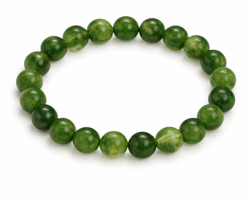 Green beaded bracelet on a white background