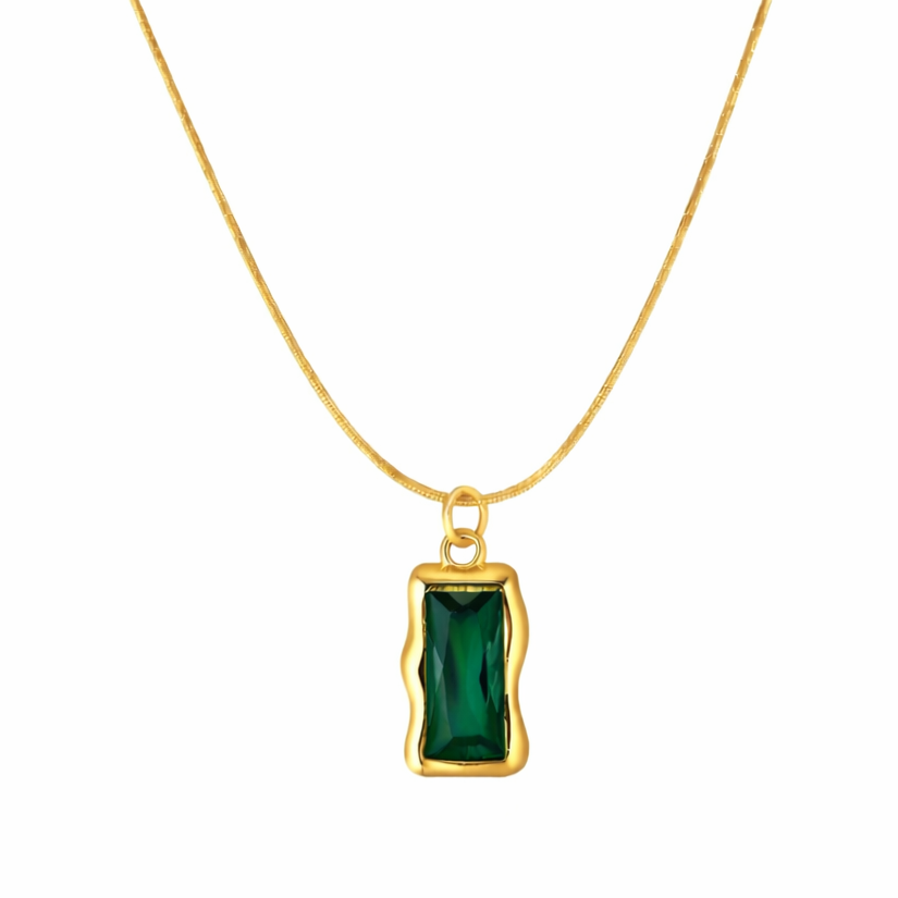 Gold necklace with a green pendant on a white background