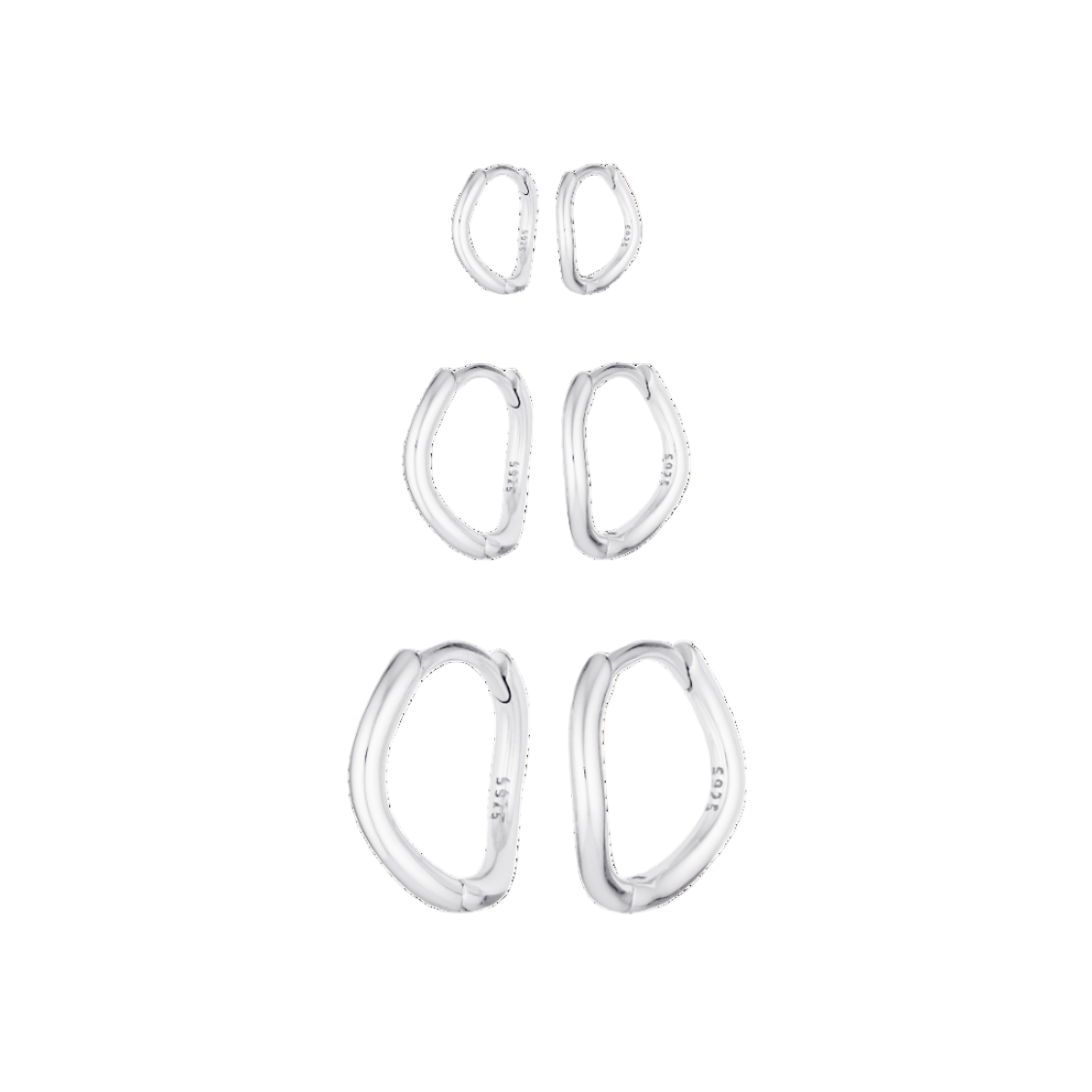 Set of silver hoop earrings on a white background
