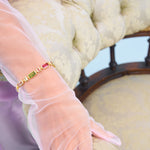 Decadent gemstone and 18k gold bracelet 