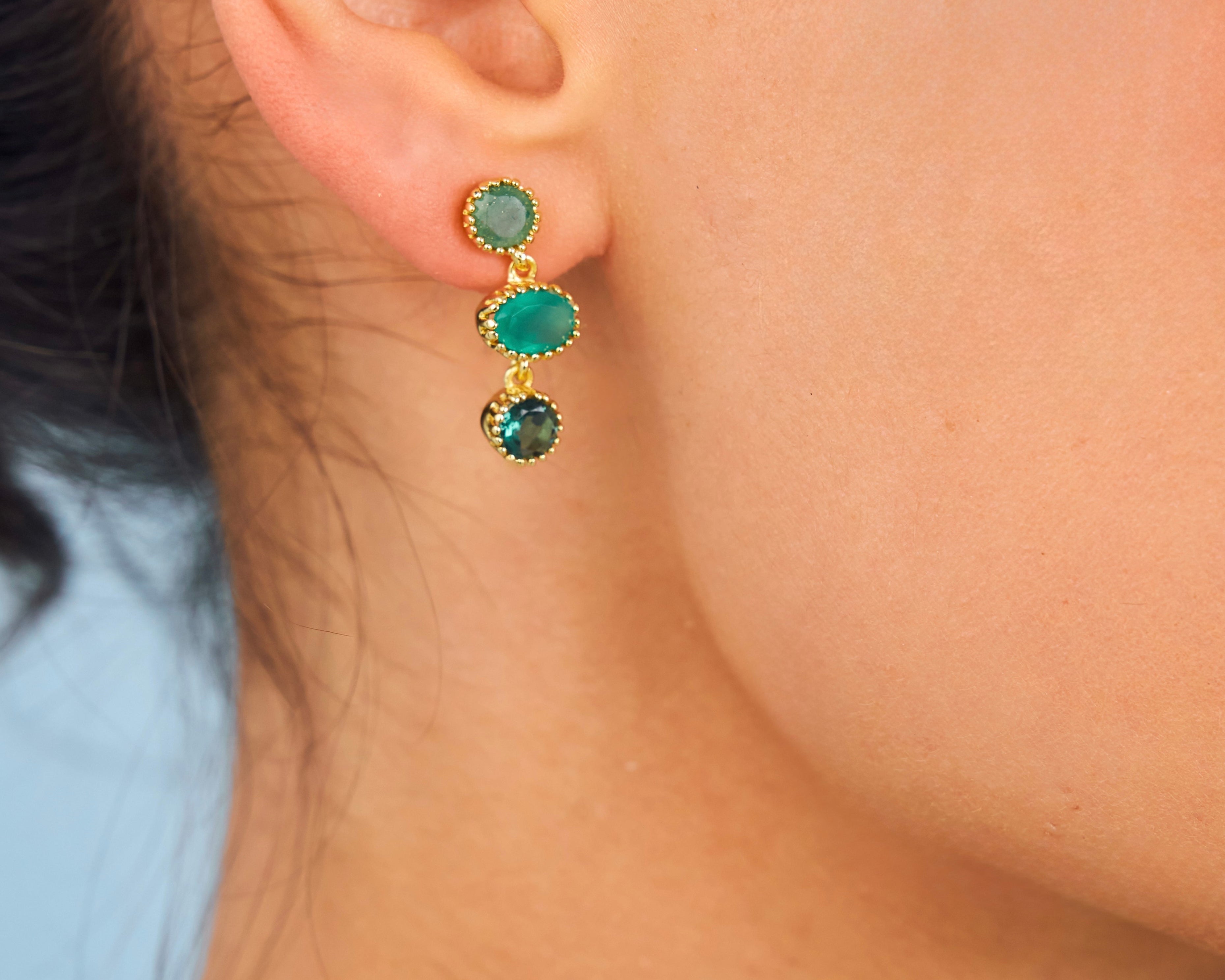 Close up of Emeraude earrings in green onyx and jade 