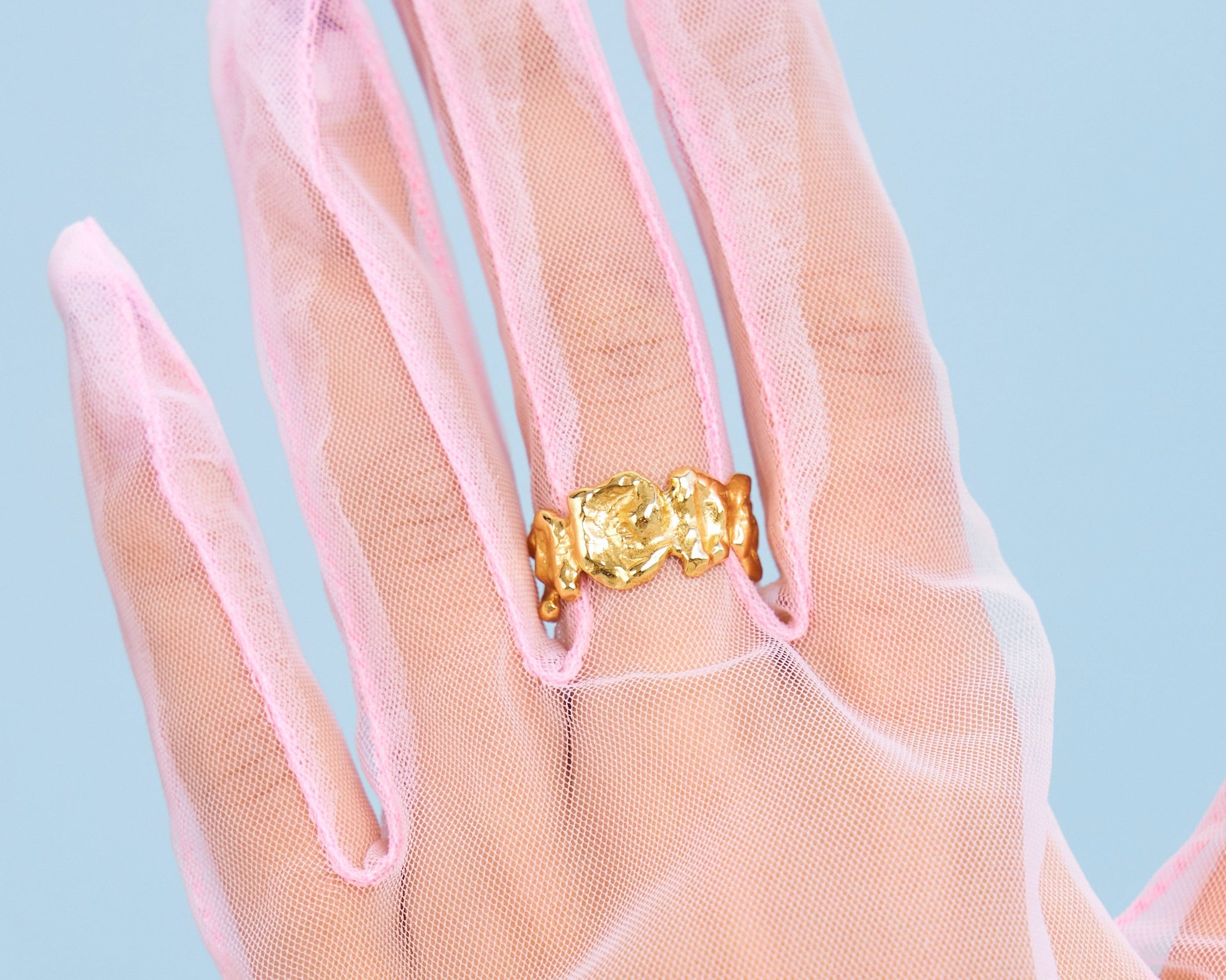 Close p of Luna Ring on gloved hand 