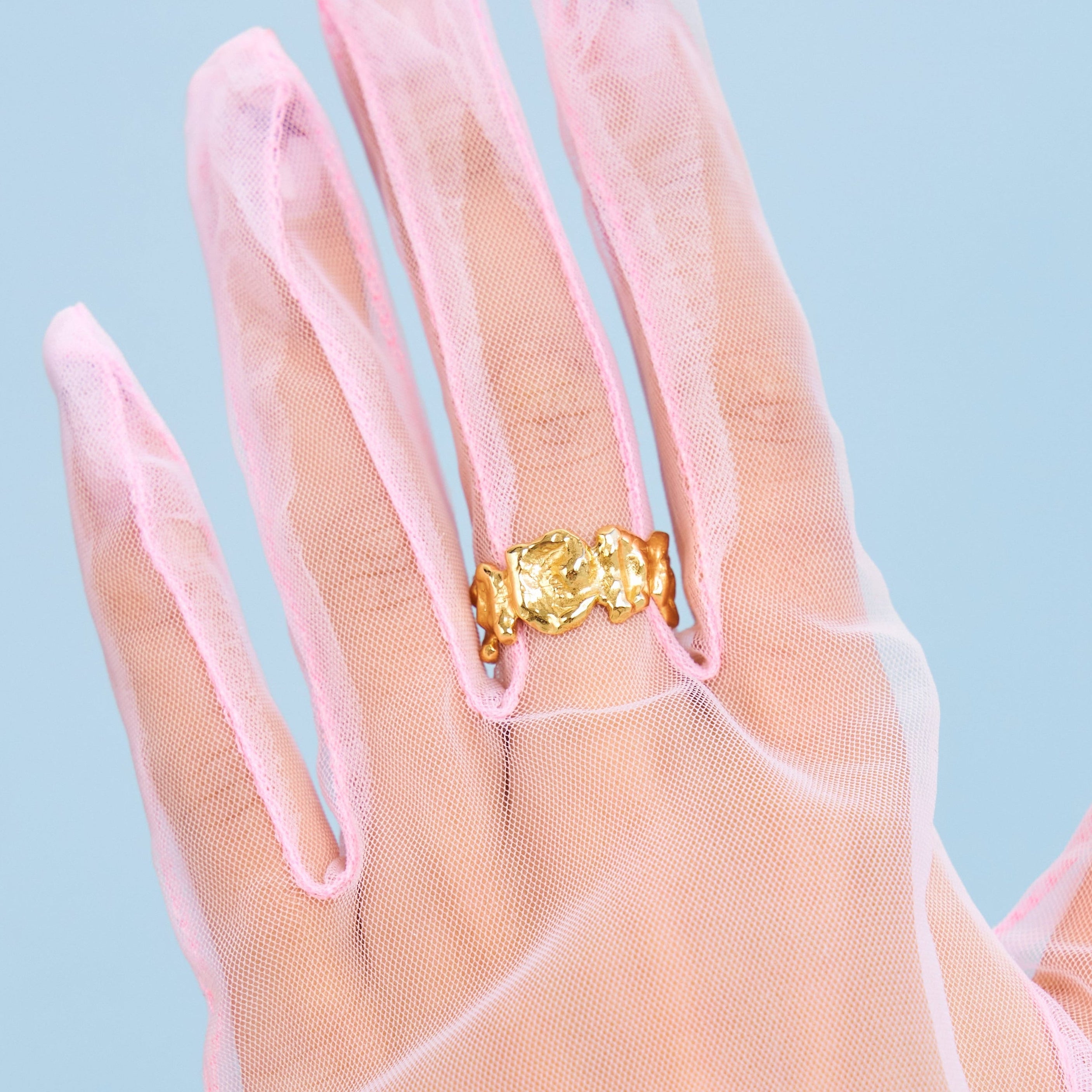 Close p of Luna Ring on gloved hand 