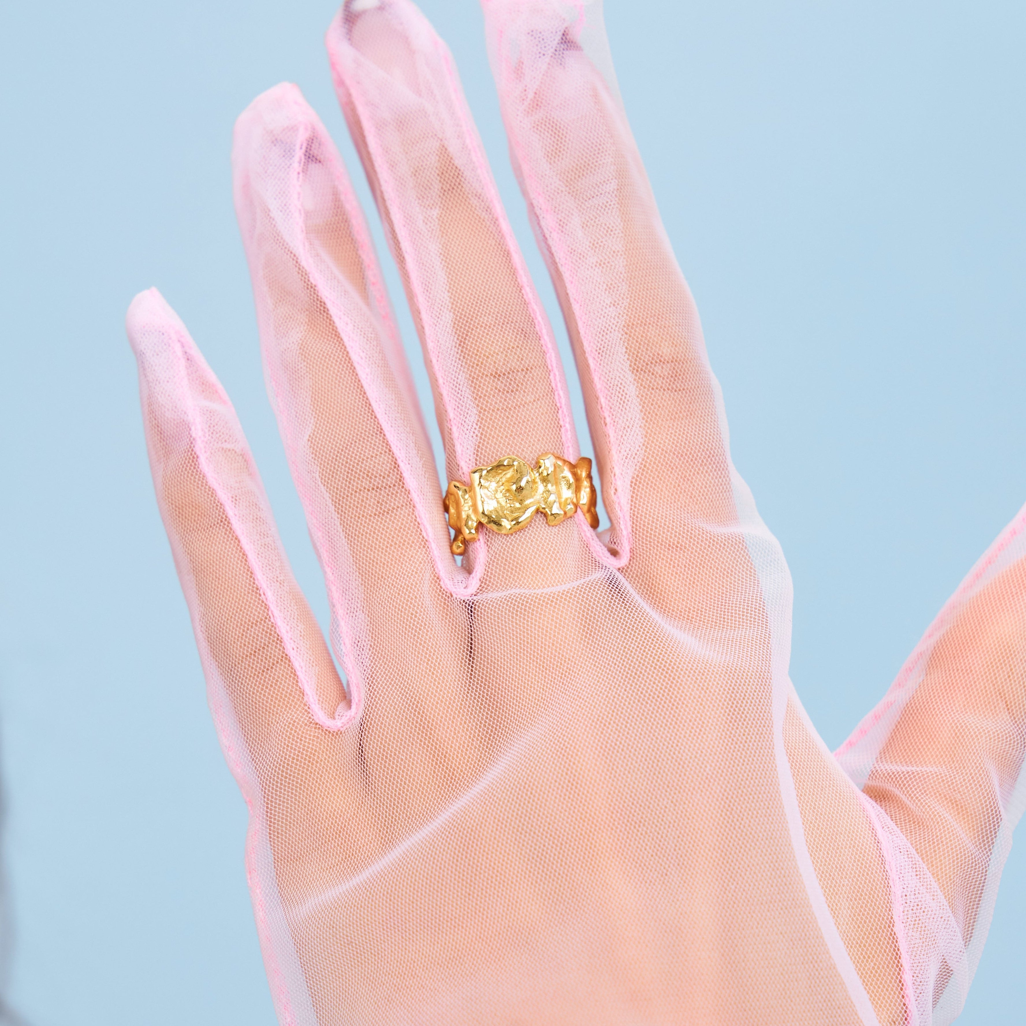 Close p of Luna Ring on gloved hand 
