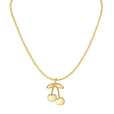 Gold necklace with a cherry pendant on a white background