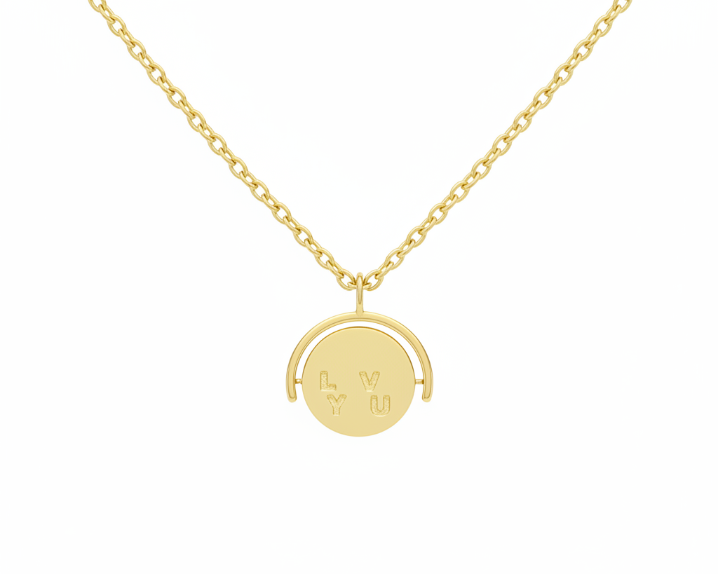 Gold necklace with a round pendant on a white background