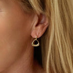 Musical Huggies shaped like a triangle in 14k Gold