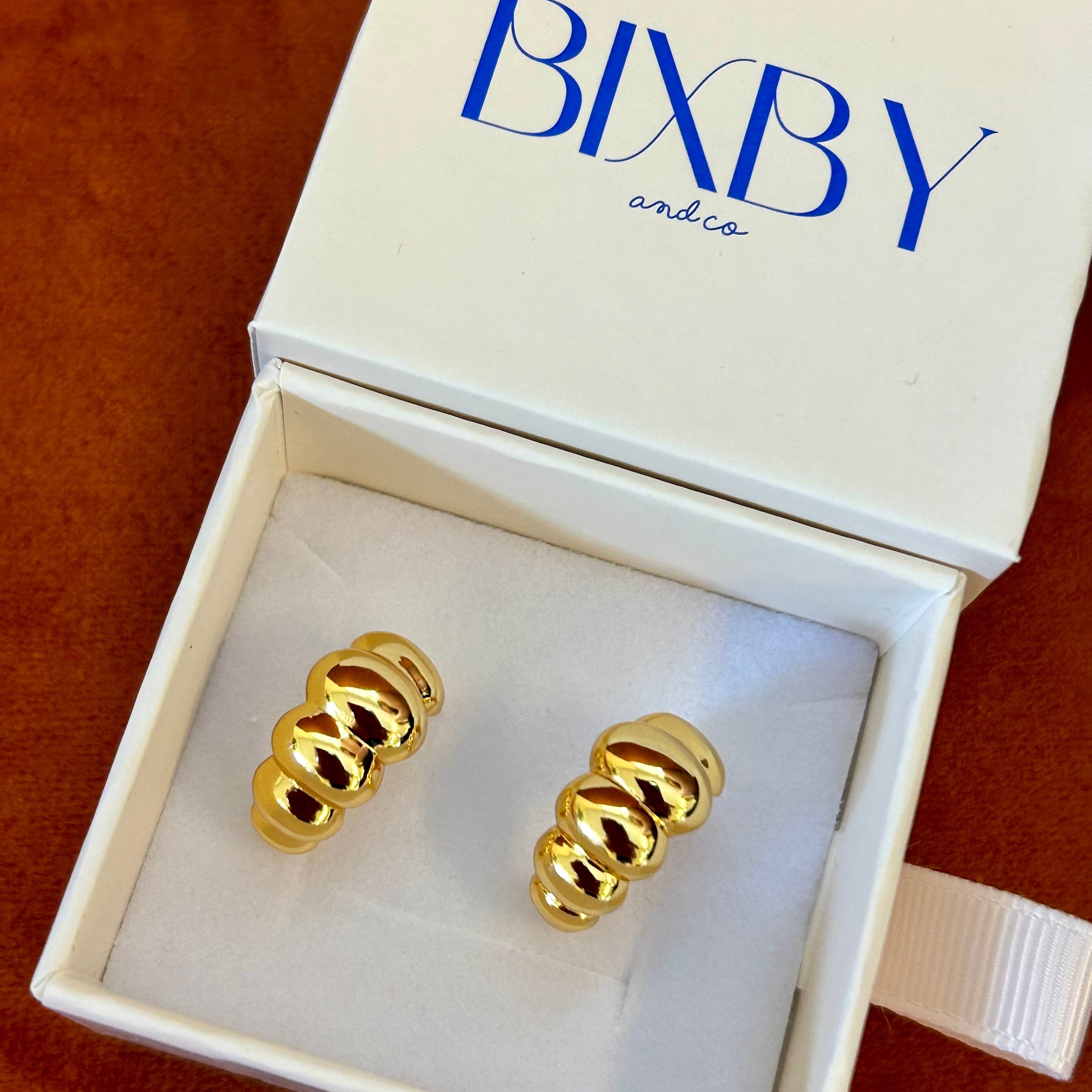 Soft sculptural formed stud hoops