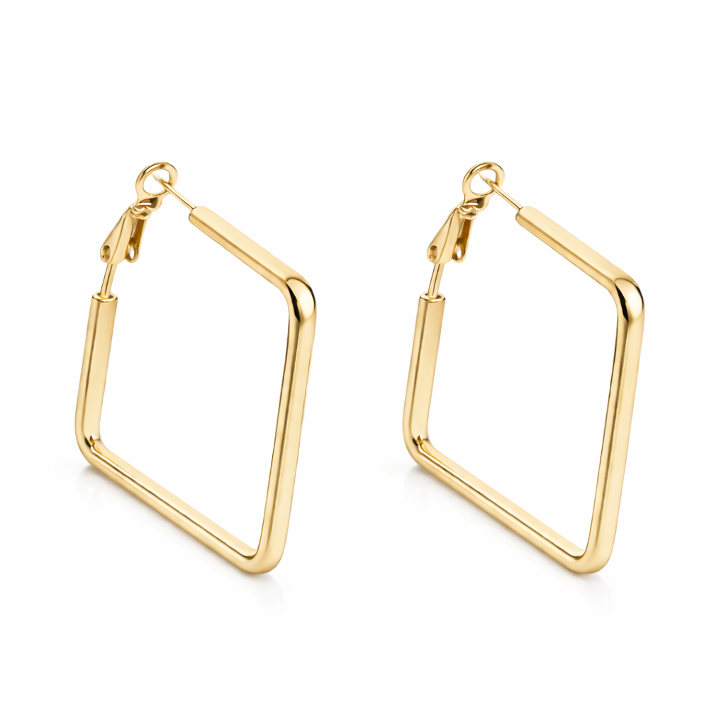 Gold hoop earrings on a white background