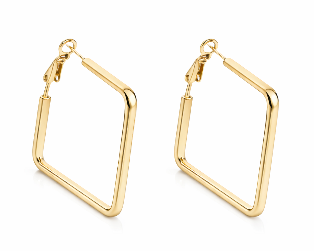 Gold hoop earrings on a white background
