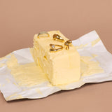 New Champagne Collection jewellery isplayed in a stick of butter 
