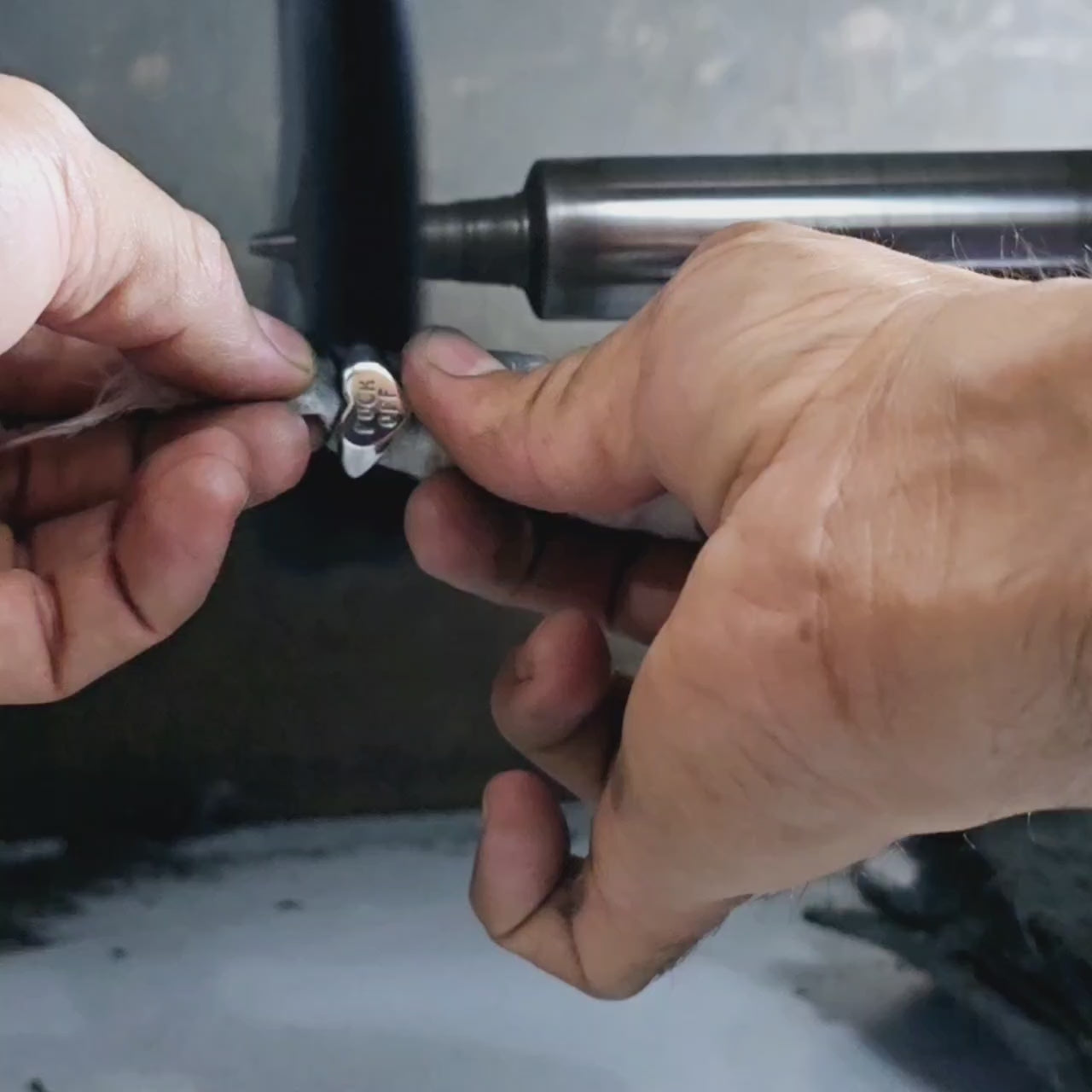Video showing ring being hand polished 