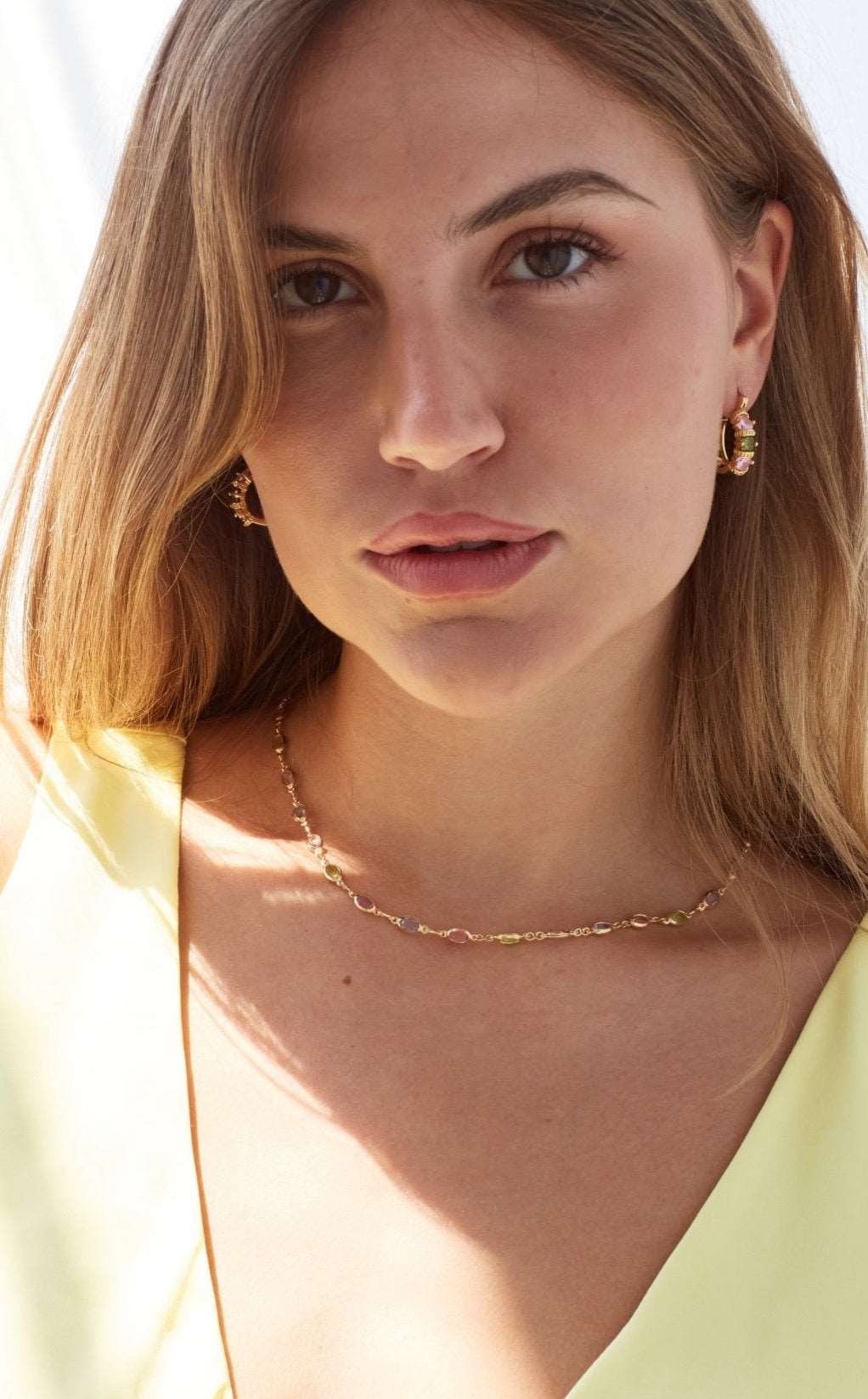 Model in Bixby and Co multicoloured jewellery set