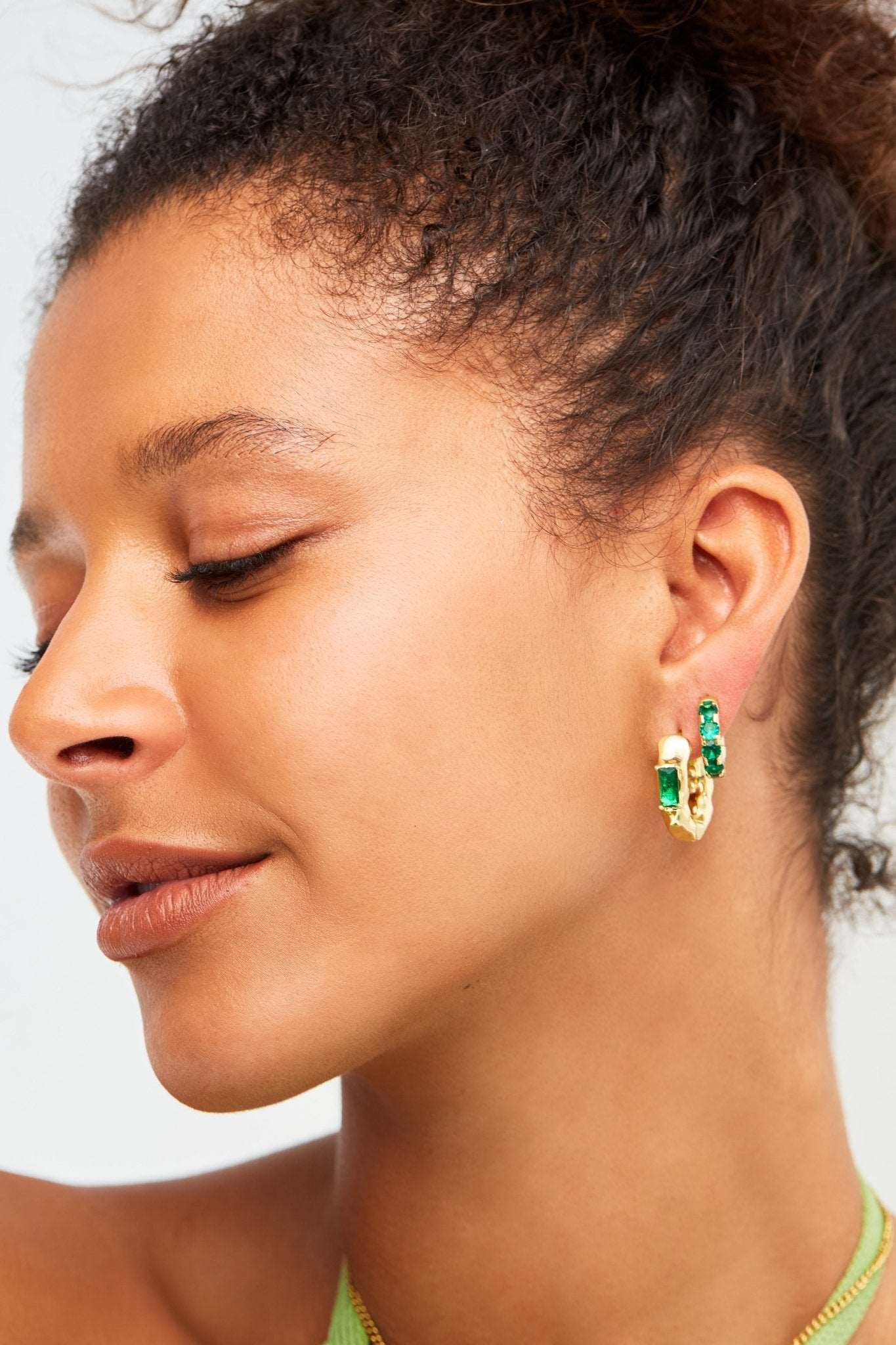 Model wearing Xmas gift sets of earrings 