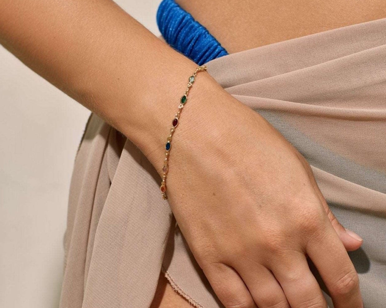 Model in dainty size colour bracelet 