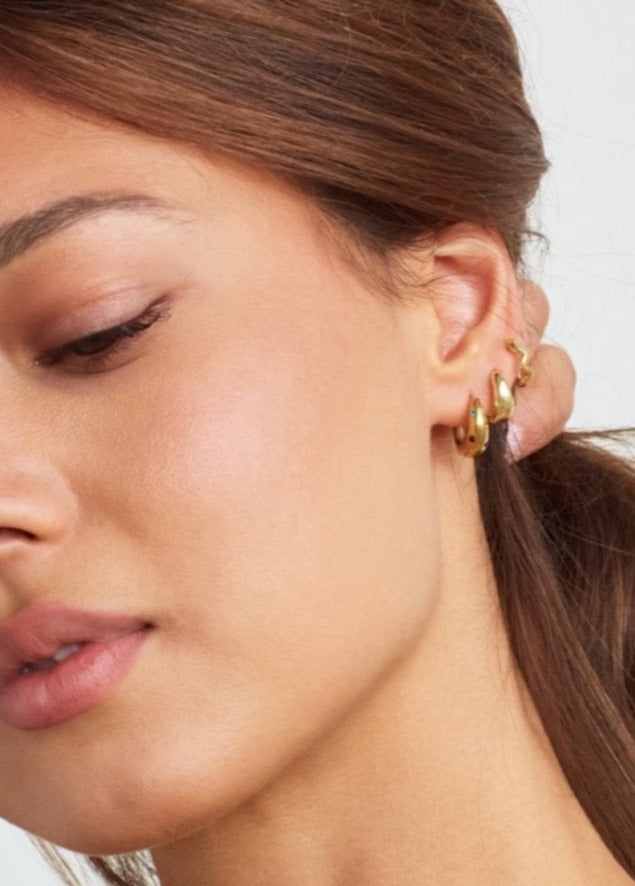 Model in Bixby and Co earring stack 